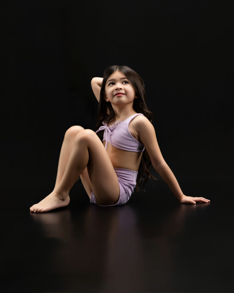 dancer doing an artistic  floor pose in fort wayne