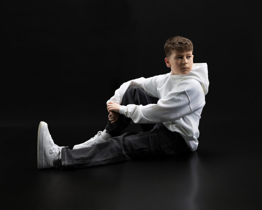 male dancer doing an artistic floor pose in fort wayne